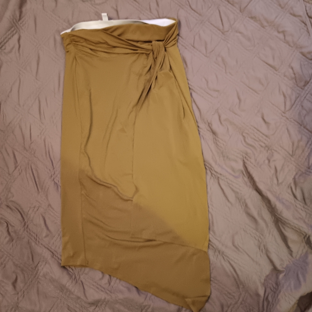 Nine West Skirt. Pretty Tan color. Great for spring. Never worn out. Only try on